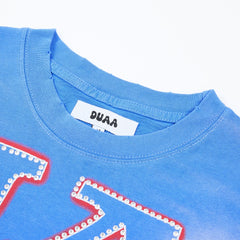 DUAA Celia Cruz Queen of Salsa Oversized Graphic Tee — Blue