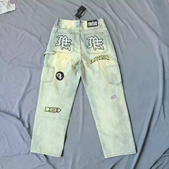 Mixed Emotion Multi‑Patch Distressed Carpenter Jeans
