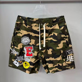 Mixed Emotion Camo Multi‑Patch Cargo Shorts