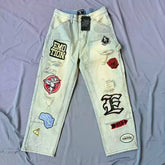 Mixed Emotion Multi‑Patch Distressed Carpenter Jeans