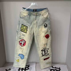 Mixed Emotion Multi‑Patch Distressed Carpenter Jeans