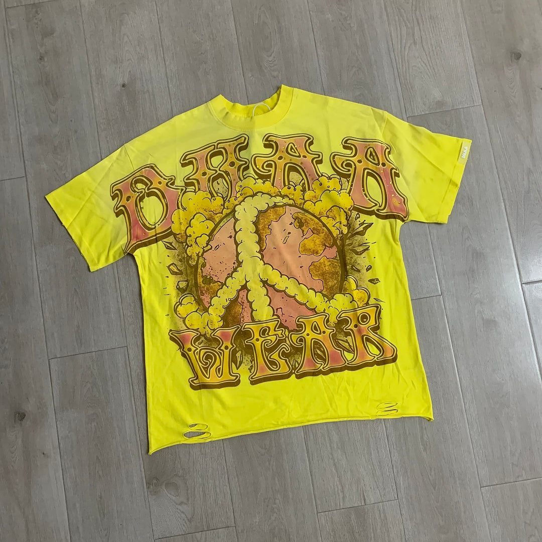 DUAA Wear Peace Earth Oversized Graphic Tee — Yellow