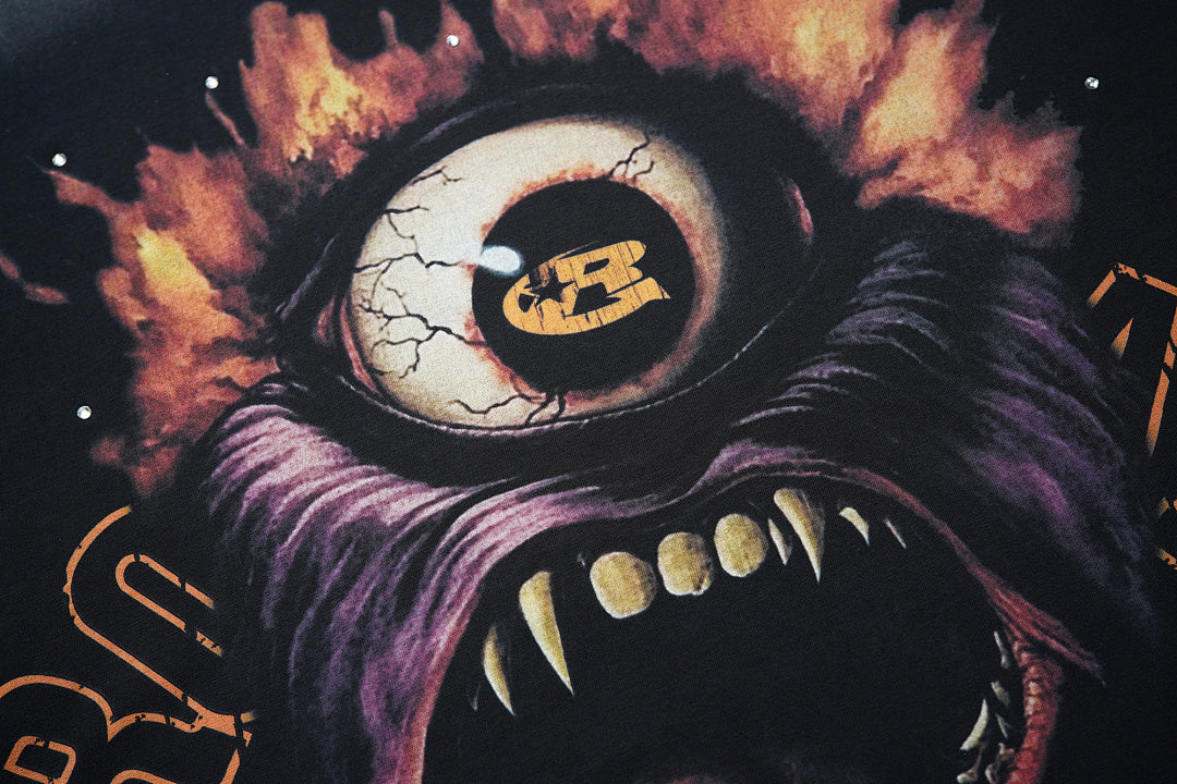 Rough Play Fire Eye Monster Oversized Graphic Tee — Black