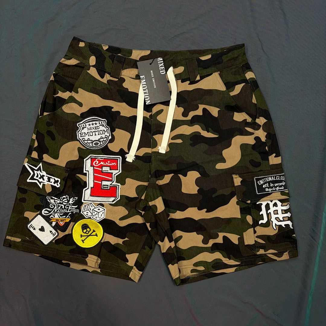 Mixed Emotion Camo Multi‑Patch Cargo Shorts