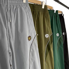 Broken Planet Curved Panel Nylon Track Pants - 4 Colors Available
