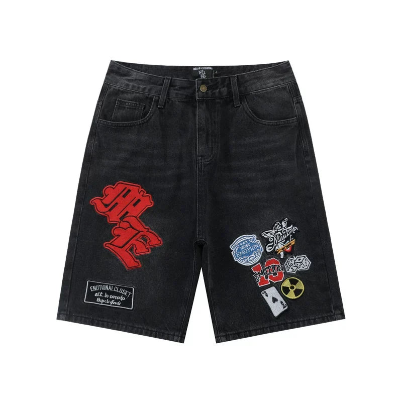 Mixed Emotion Multi‑Patch Black Denim Jorts