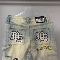 Mixed Emotion Multi‑Patch Distressed Carpenter Jeans