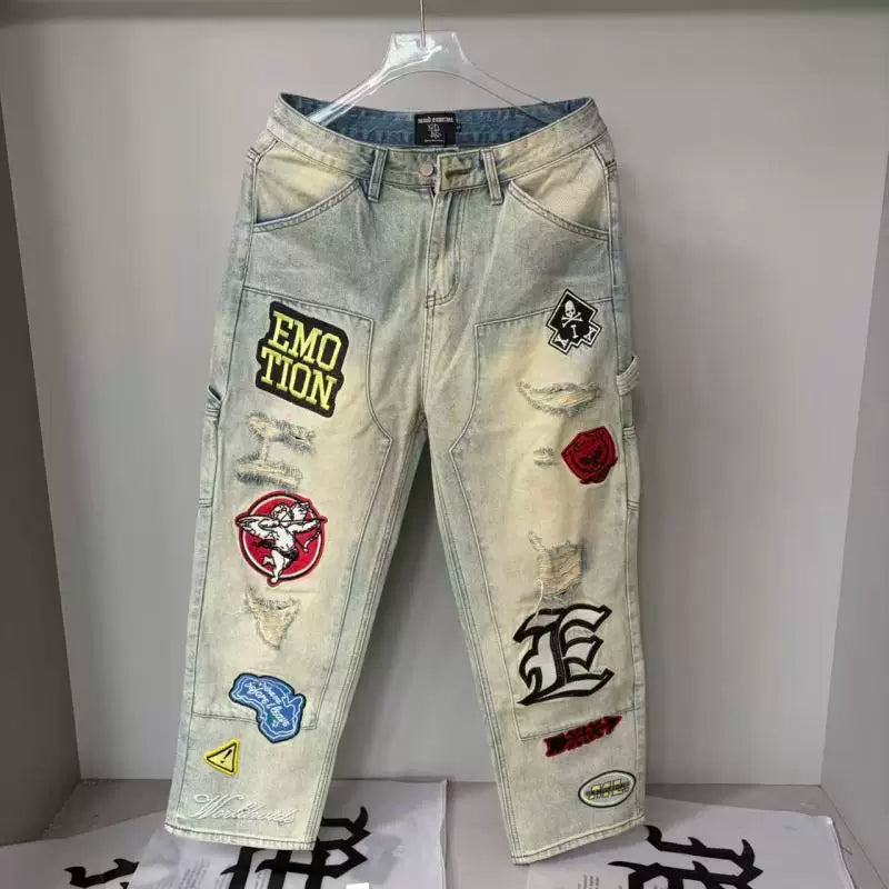 Mixed Emotion Multi‑Patch Distressed Carpenter Jeans